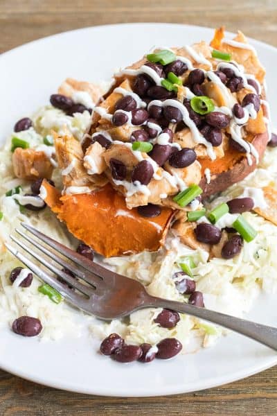 BBQ Chicken Stuffed Yams with Coleslaw is a healthy weeknight dinner that's loaded with flavor and is a sure-fire crowd pleaser!