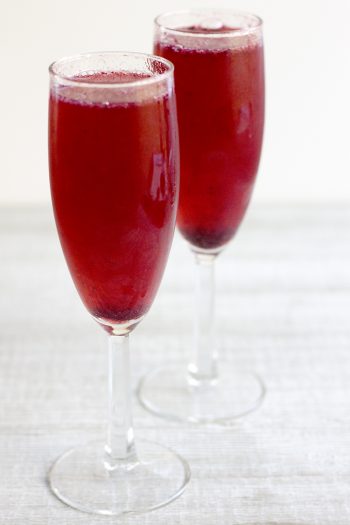 This Blackberry Mint Bellini is a creeper cocktail cleverly disguised as a posh brunch drink!