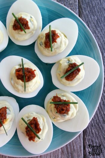 Three of my favorite flavors come together for a crave-able little bite in these Spinach & Sun Dried Tomato Deviled Eggs!