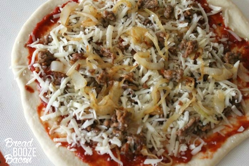 This Italian Sausage + Caramelize Onion Pizza is totally worth skipping take out for!
