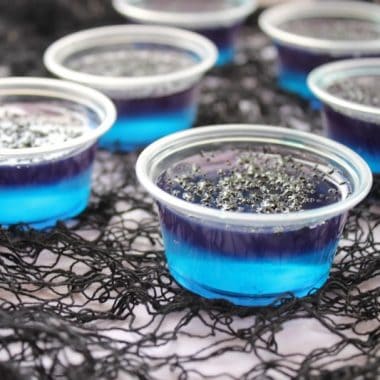 Black Magic Jello Shots are fun layered jello shots that are perfect for your Halloween party! Everyone will think they're magical!