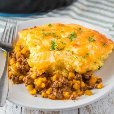 Skillet Sloppy Joe Cornbread Casserole is a less messy way to enjoy a classic dish! It's an easy 30-minute meal that'll have your family asking for seconds!