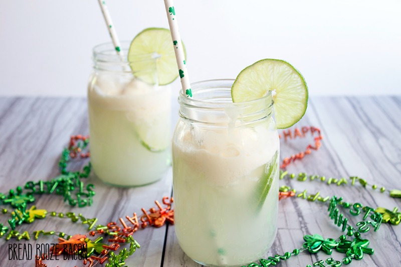 Forget creamsicles! Spiked Lime Ice Cream Soda is where it's at for a refreshing, citrusy cocktail! It's perfect for St. Patrick's Day or a warm day!
