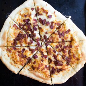 Bacon Alfredo Pizza brings together simple ingredients to create a carve-able flavor you'll love!