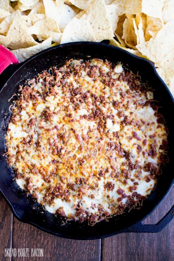 Take a trip to cheese town with this awesome Chorizo Queso Fundido! This cheesy, spicy dip is everything right about adding beer to your food!