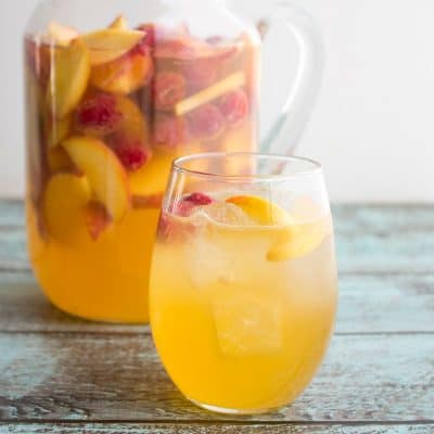 Bring on summer and a never ending pitcher of this Peach & Raspberry Moscato Punch! It's crazy good and made for sipping poolside!