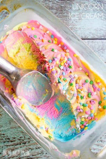 Unicorn Ice Cream is magic on a cone! There's nothing better on a hot day than rainbow ice cream that's covered in star sprinkles and glitter!