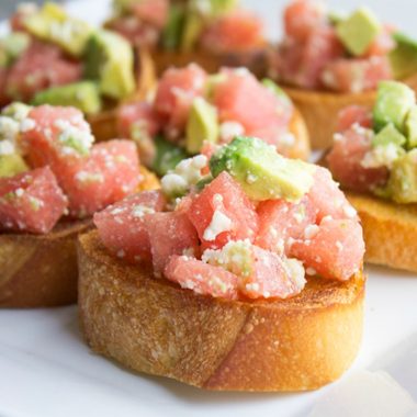 I love easy summer appetizers! This Watermelon & Avocado Bruschetta is light & refreshing for a flavor combination that's a delightful surprise!