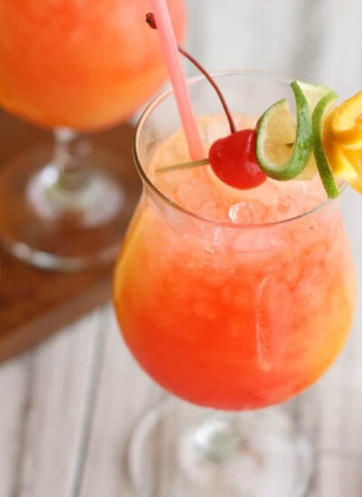 Add a splash of the tropics to your next get together with this Hurricane Party Punch Recipe!