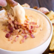 This Beer Bacon and Cheese Dip Recipe is a rich and creamy appetizer that's perfect with pretzels and is guaranteed to be the talk of your next party!