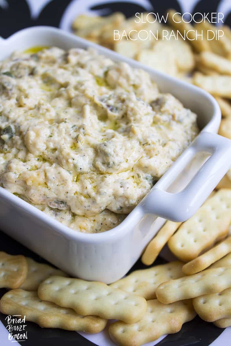 Slow Cooker Bacon Ranch Dip is my go to dip for game day. Super cheesy and studded with bacon, this easy to make dip is always a crowd pleaser!