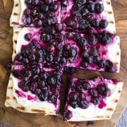 This Grilled Blueberry Dessert Pizza Recipe is a perfect dessert for your next cookout! Prep your ingredients ahead of time and bring everything together in just 10 minutes!