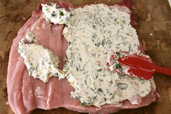 Spinach Dip Stuffed Pork Loin is an easy-to-make meal, perfect for bringing the people you care about around the dinner table!