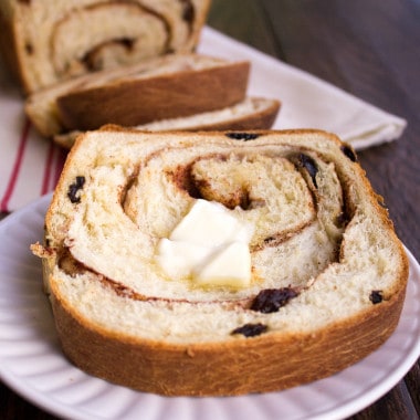This Cinnamon Raisin Bread Recipe is home-baked goodness at it's finest! Your house is going to smell amazing!