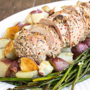 One Pan Pork Tenderloin with Asparagus & Potatoes is a delicious family-style meal that's easy enough for weeknights and special enough for holidays!