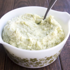 One bite of these creamy, flavorful Pesto Mashed Potatoes and you'll be hooked!