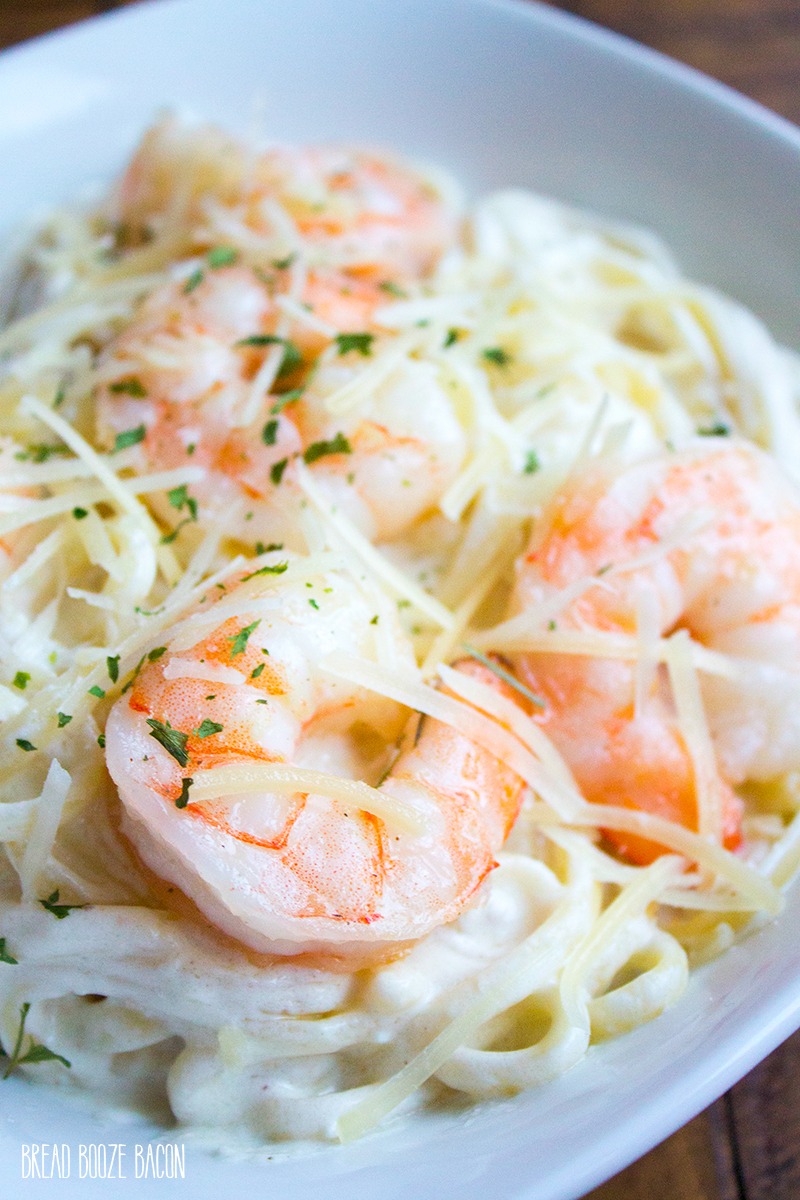 Get dinner on the table in about 15 minutes with this Easy Shrimp Alfredo recipe that'll rival any restaurant!