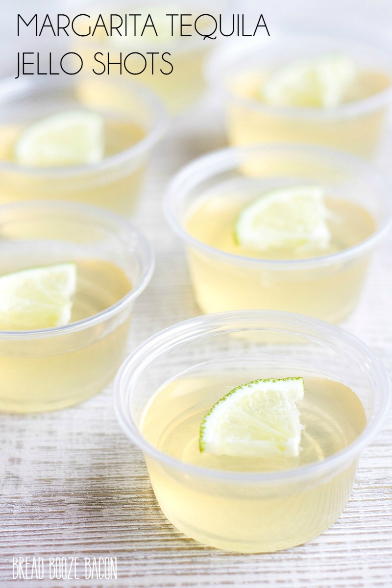 margarita tequila jello shots in cups garnish with a piece of lime