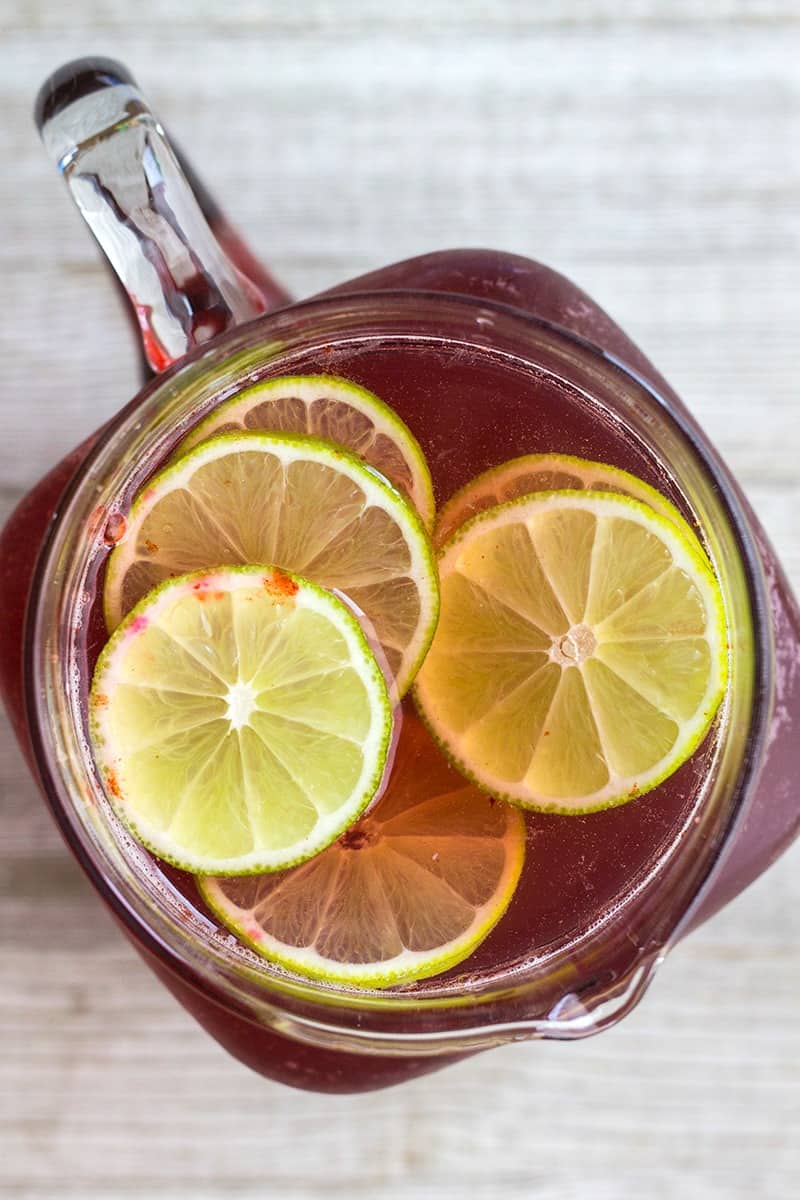 Cranberry & Cherry Punch is easy to make and delicious to drink! This punch a favorite at parties and a great pitcher cocktail option any time of year!