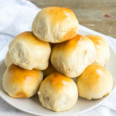 These slightly sweet and oh so fluffy 40-Minute Milk and Honey Dinner Rolls are perfect for weeknights or holiday dinners. So easy to make, they're a must-have recipe for any home cook!