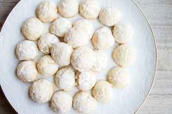 5-Ingredient Vanilla Almond Snowball Cookies are an easy holiday cookie that's a favorite at Christmas time! Make a double batch and share with friends!