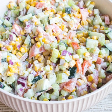 Fresh Vegetable Salad is a quick & easy recipe that's loaded with veggies and tossed in a creamy dressing making it the perfect side dish for potlucks!