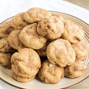 Rich cookie butter, salty pretzels & white chocolate in these Loaded Cookie Butter Snickerdoodles are a delicious twist on a classic snickerdoodle cookie!