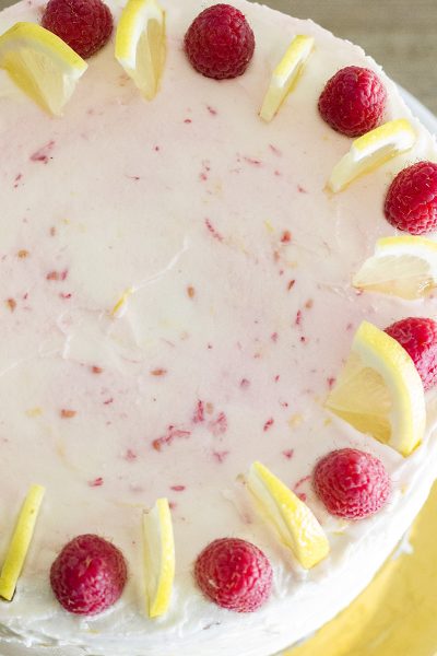 This gorgeous Lemon Raspberry Cake is a dessert lovers dream! Layers of raspberry cake marry with lemon buttercream for an out of this world dessert!