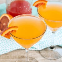 Sparkling Blood Orange Cocktail is a fruity & fizzy punch that's great for brunch or sipping with friends! A light & refreshing punch with a beautiful blush!