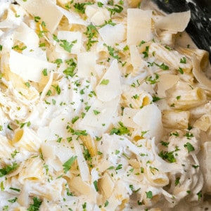 Lusciously creamy, easy to make, and a family favorite dinner! This Crock Pot Chicken Alfredo is great for serving a crowd, or store half in the freezer to reheat later!