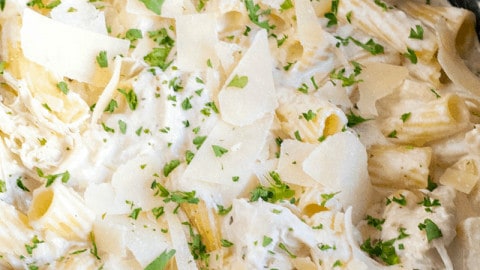 Lusciously creamy, easy to make, and a family favorite dinner! This Crock Pot Chicken Alfredo is great for serving a crowd, or store half in the freezer to reheat later!