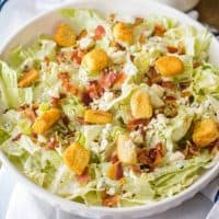 Craving salad? This easy Chopped Wedge Salad is my go-to whether I'm at home or out to eat! Blue cheese & bacon together are always a good idea!
