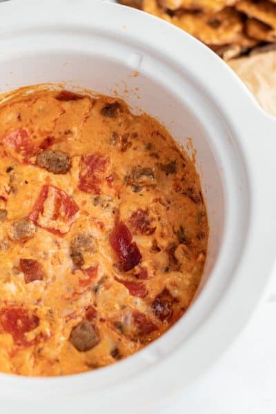 close up of pizza dip in a slow cooker after cooking