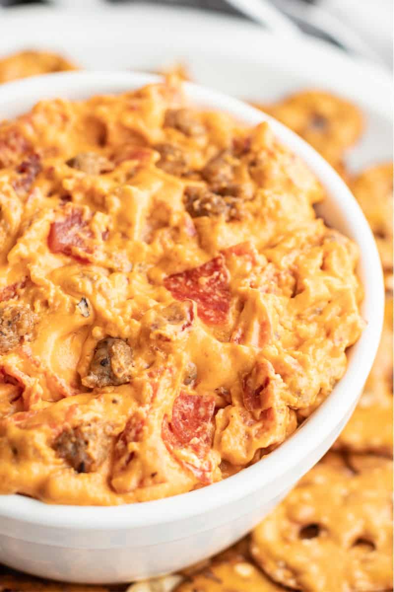 close up of pizza dip in a bowl