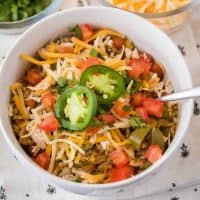 Get dinner on the table in 35 minutes with this healthy Instant Pot Fajita Burrito Bowl recipe! Super easy to make & customize with your favorite toppings!