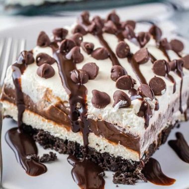 No Bake Chocolate Lasagna is a chocolate lover's dream! Creamy, luscious, and crazy easy to make! The hardest part is waiting for it to set!