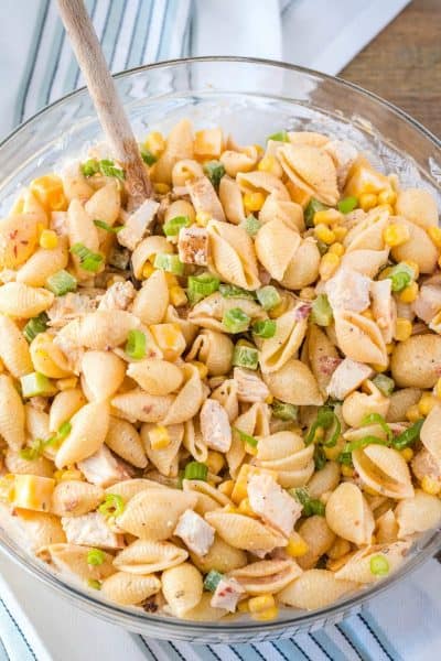 chipotle chicken pasta salad mixed up in a serving bowl