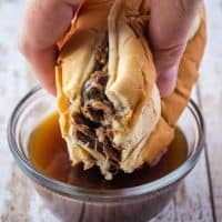 Crock Pot French Dip sandwiches are a favorite at our house! Set and forget, and perfect for feeding a crowd! Serve with or without onions for a dinner win!