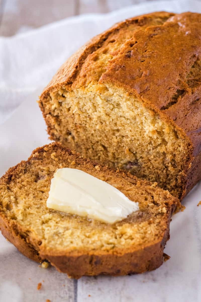 slice of banana bread with butter on top