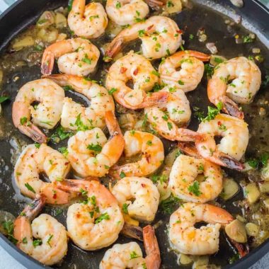 Easy Shrimp Scampi is a classic! Succulent shrimp swimming in garlic butter sauce is ready in about 20 minutes and will leave you wanting to lick your plate!