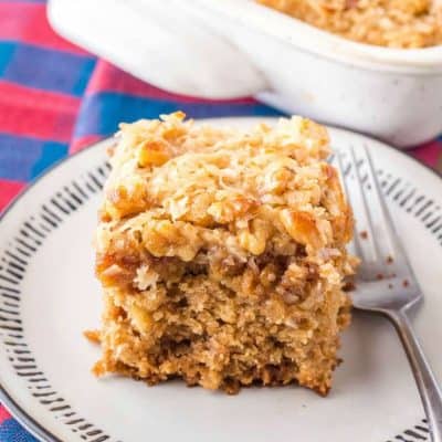 When it comes to comforting desserts, this Old-Fashioned Oatmeal Cake is everything! Topped with broiled coconut and nuts, each bite is a hug for your mouth!