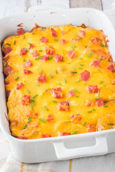 cheesey scalloped potatoes with ham in a baking dish after cooking