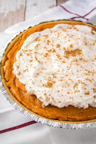no back pumpkin pie with whipped topping and chai spice on top