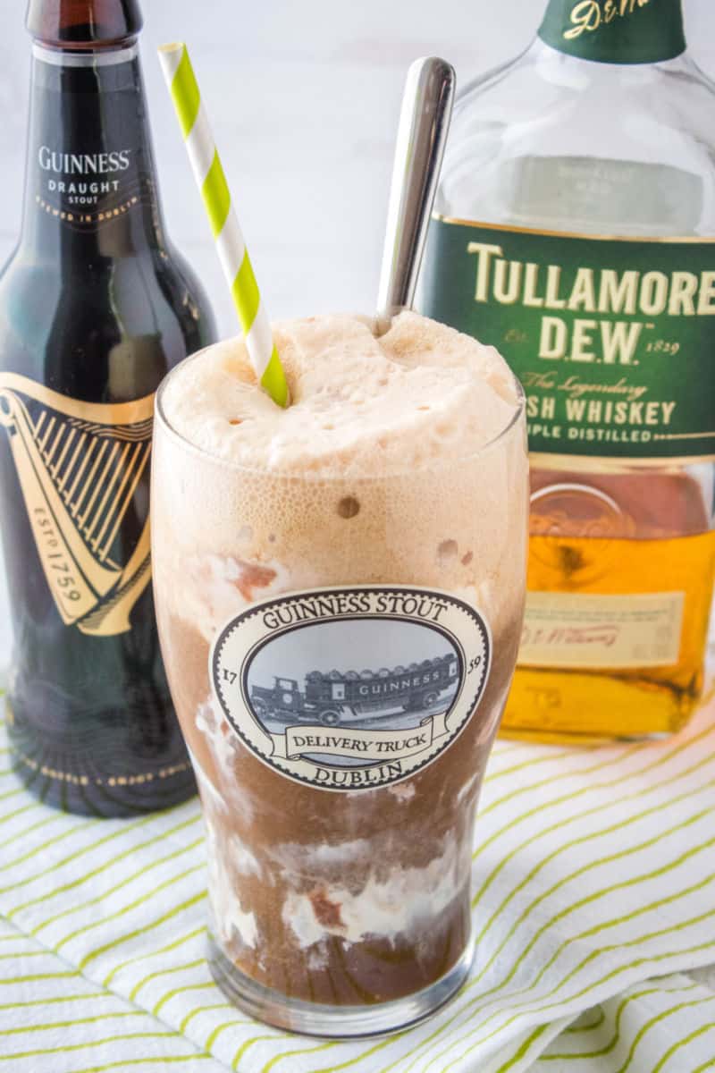 car bomb float in an imperial pint glass with a straw and spoon
