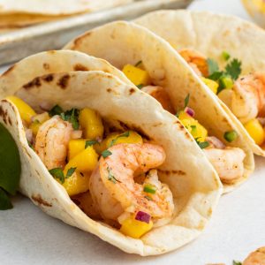 grilled shrimp and mango salsa in flour tortillas for tacos