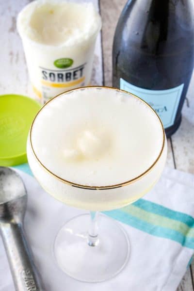 lemon sorbet in a glass with vodka and prosecco to make a sgroppino