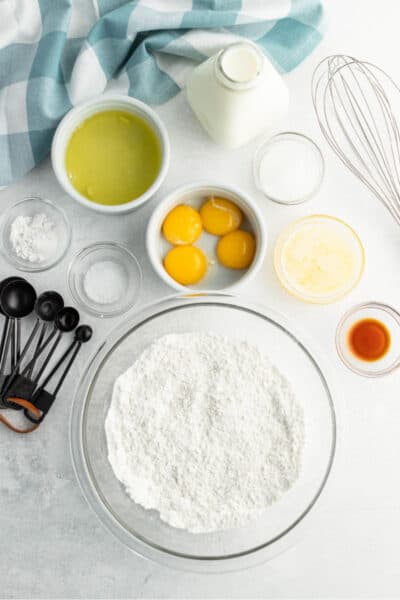 ingredients to make belgian waffles in bowls