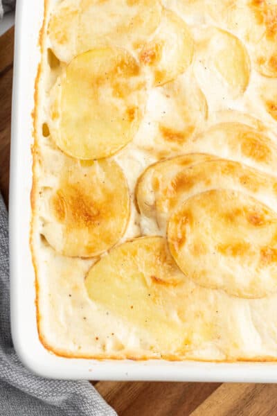 close up of scalloped potatoes in a baking dish