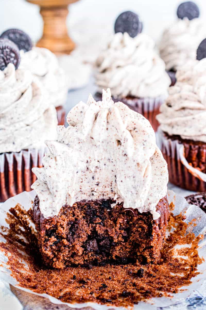 cookies & cream oreo cupcake with a bite taken out to show the crumb