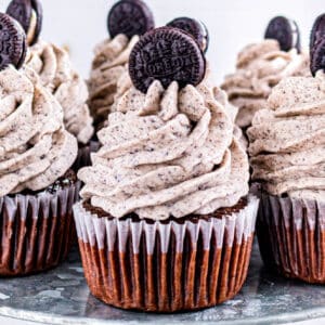 square image of cookies & cream oreo cupcakes on a cake stand